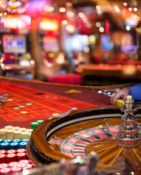 Live dealer spinning the Lightning Roulette wheel